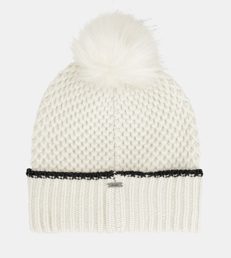 Beige knitted beanie with pompom