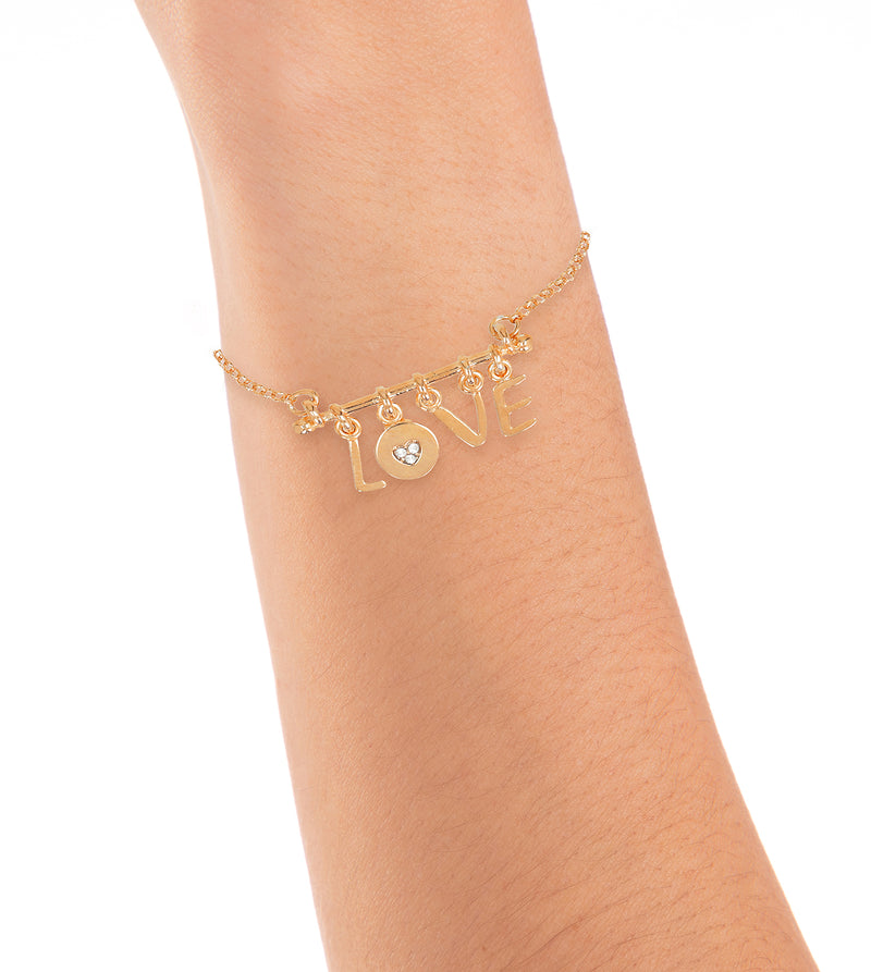 Golden bracelet with the letters LOVE