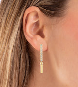 Boucles d'oreilles longues avec strass plaqués or