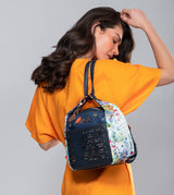 Nature Pachamama convertible crossbody bag into a backpack